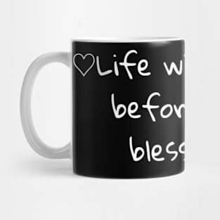 Life will test you before it will bless you Mug